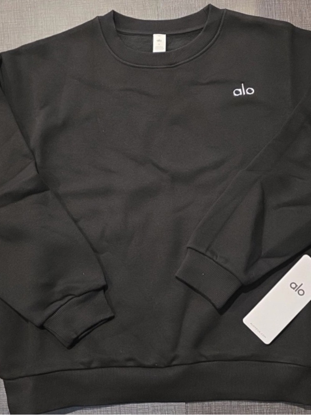 ALO Yoga women’s Black Crewneck Pullover with White Logo medium